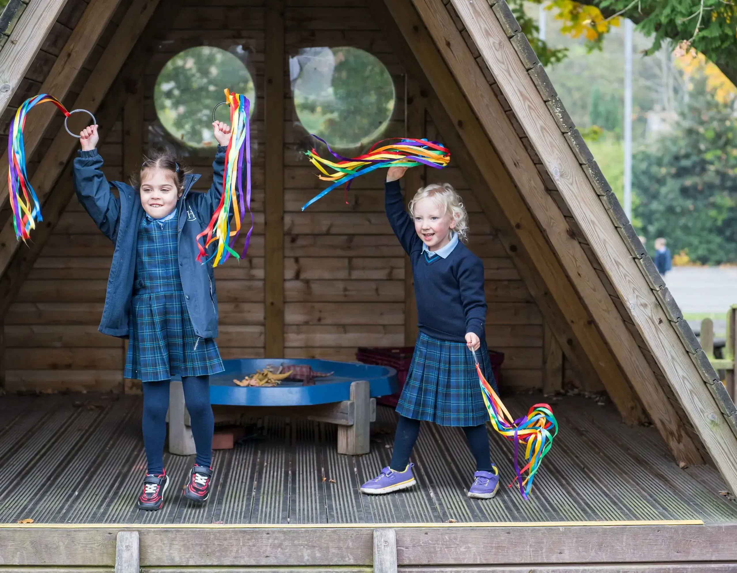  Two girls in pre-school playground