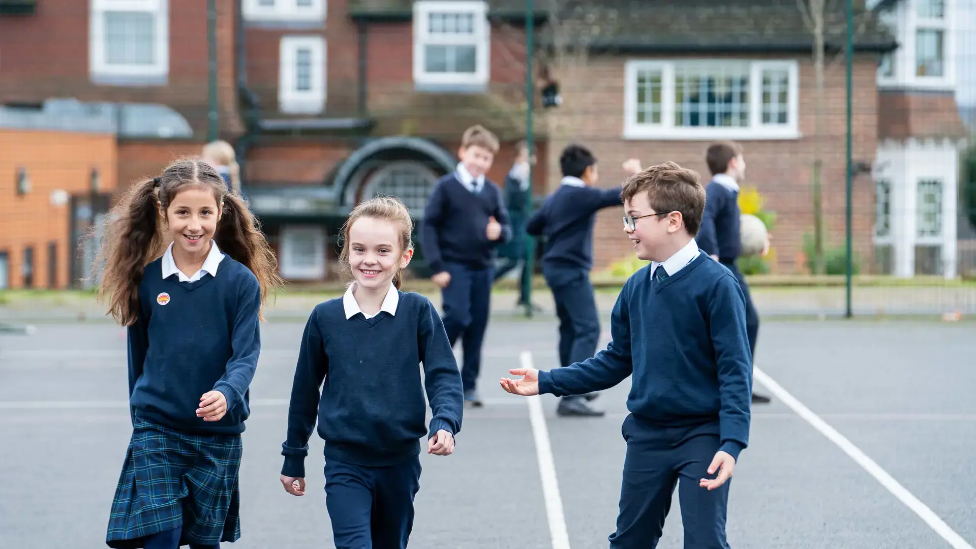 pupils on the playground at Halstead St Andrew's